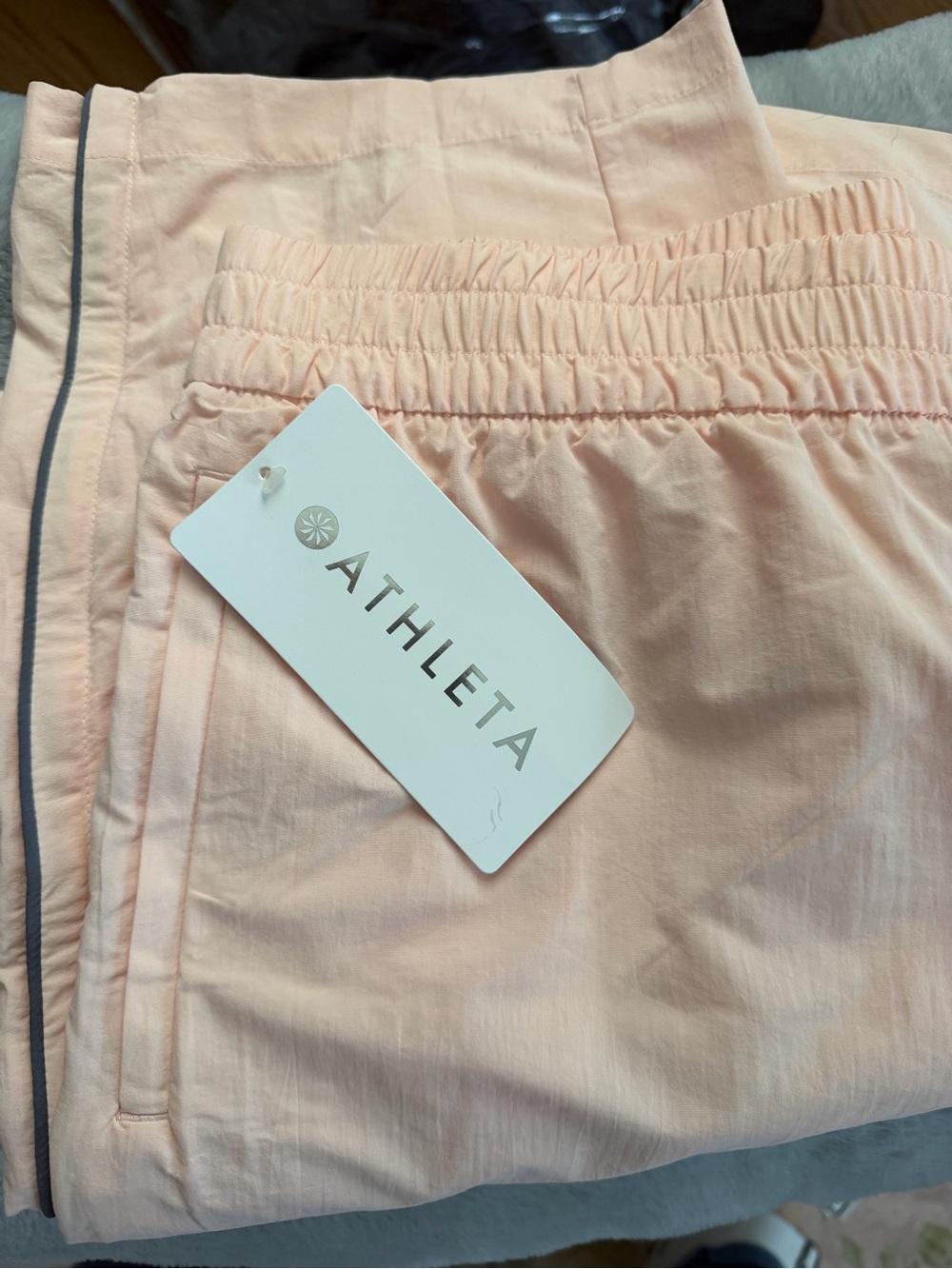 Athleta Light light pink track pants with gray Contrast Piping